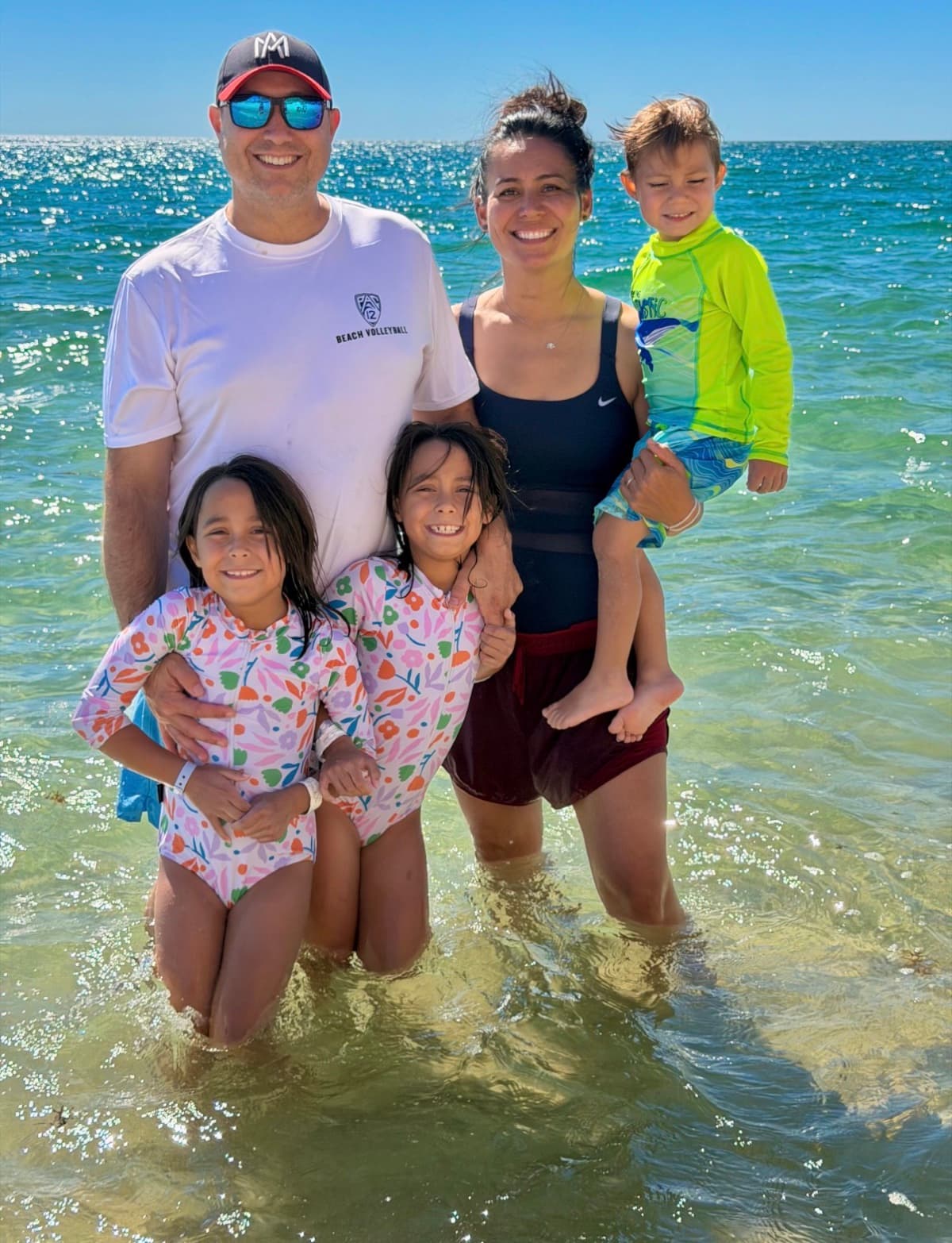 The Ericksen family standing in the shallow water at Puerto Peñasco